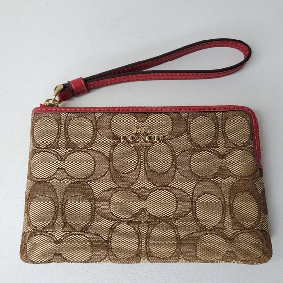 Coach Handbags - Coach Corner Zip Wristlet With Red Leather Trim